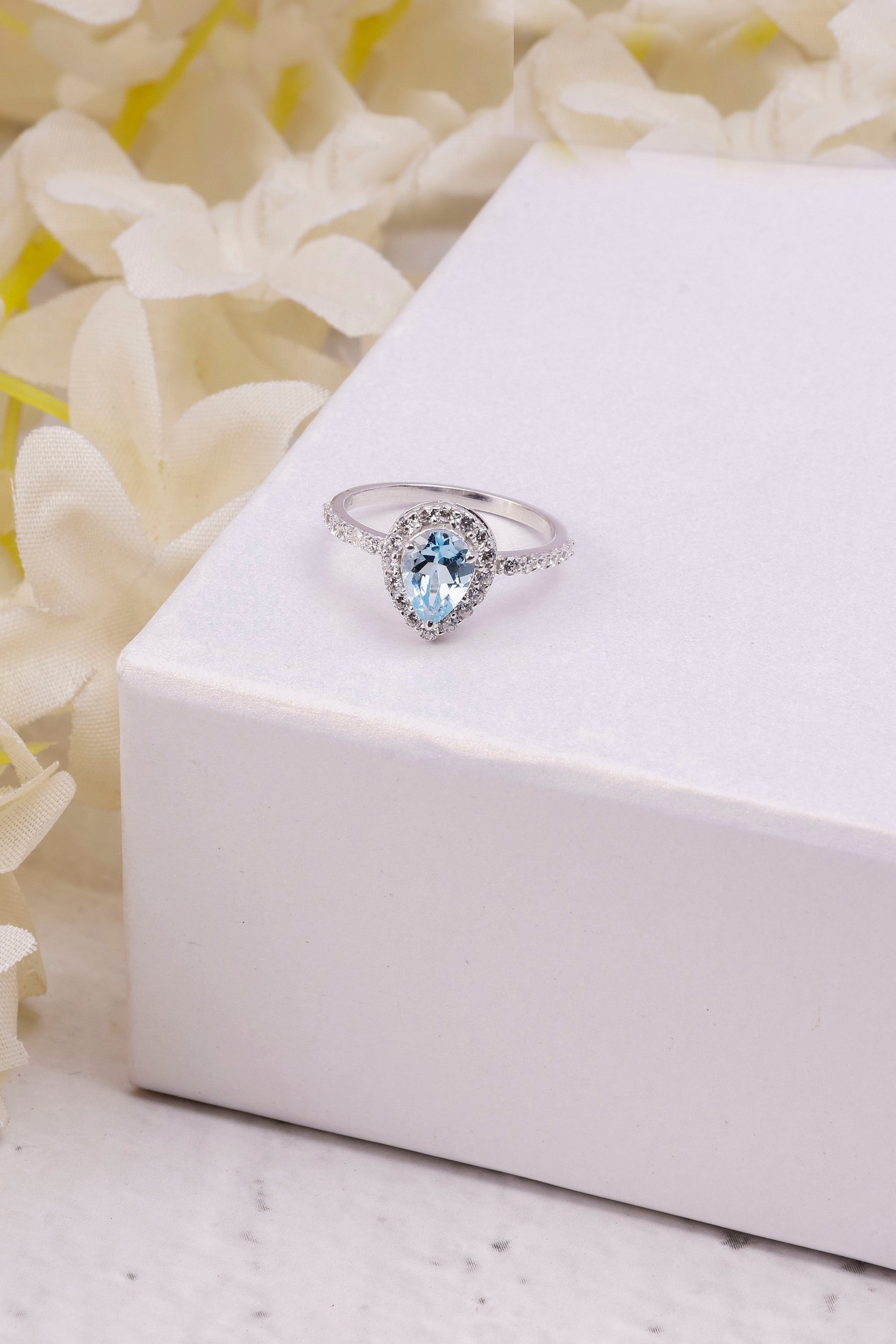 Blue Topaz Pear Ring: Sterling Silver Minimalist Design