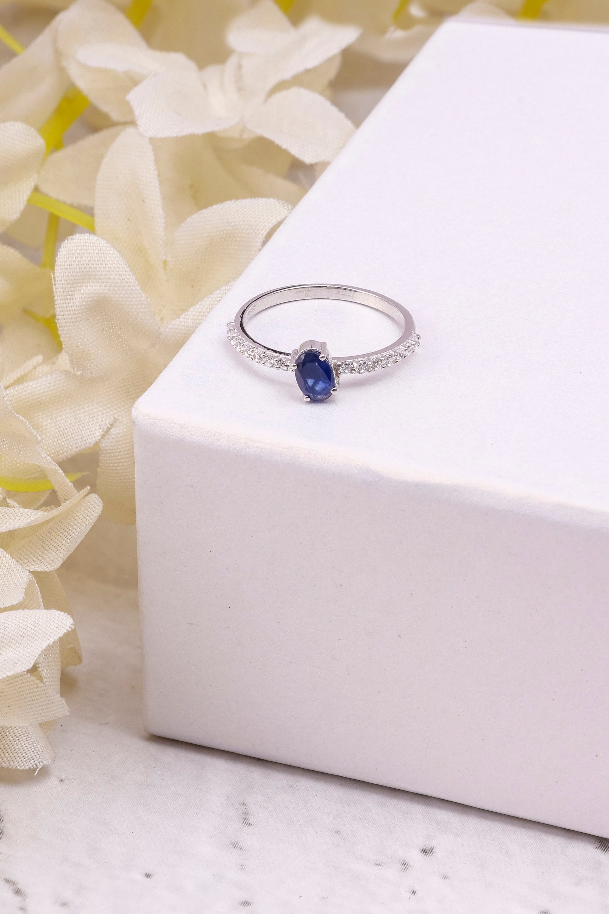 Blue Sapphire Twisted Sterling Silver Ring: Minimalist Eternity Band